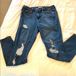 High waisted distressed Good American skinny jeans
